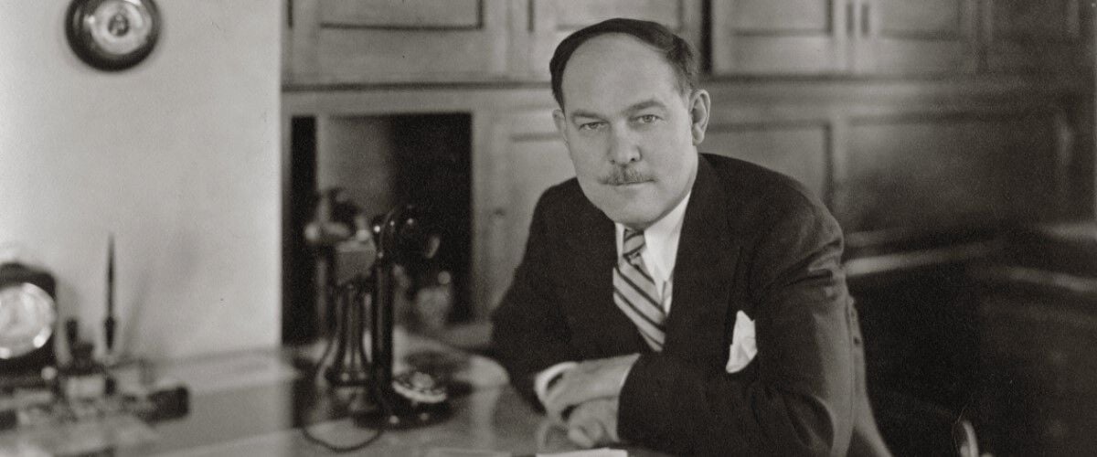 charles horn sitting at his desk