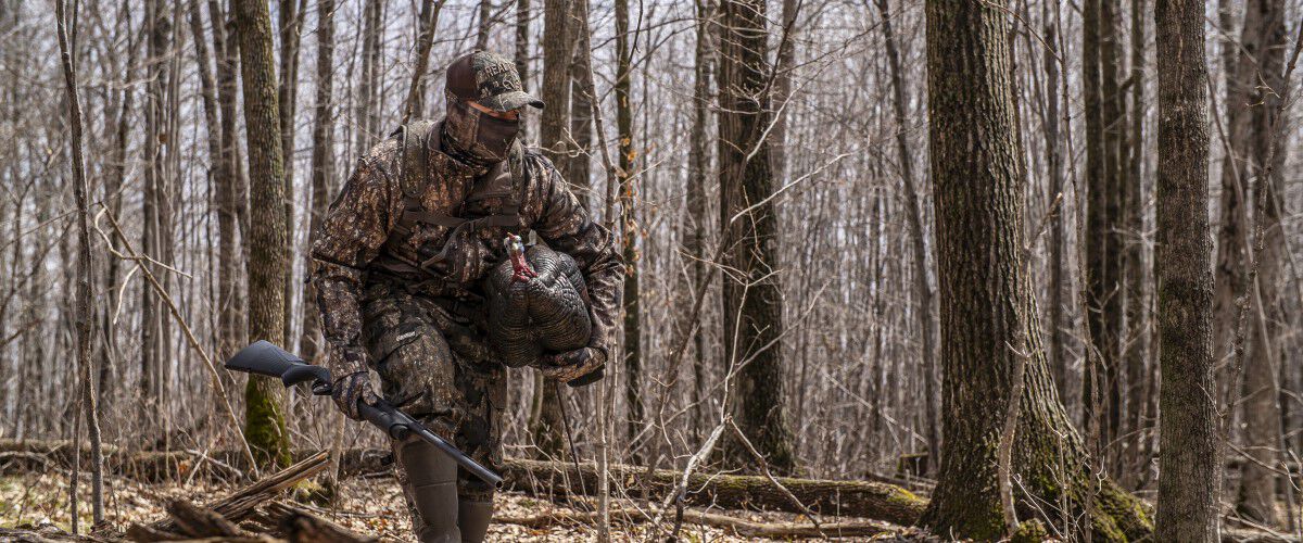 hunter stalking in the woods