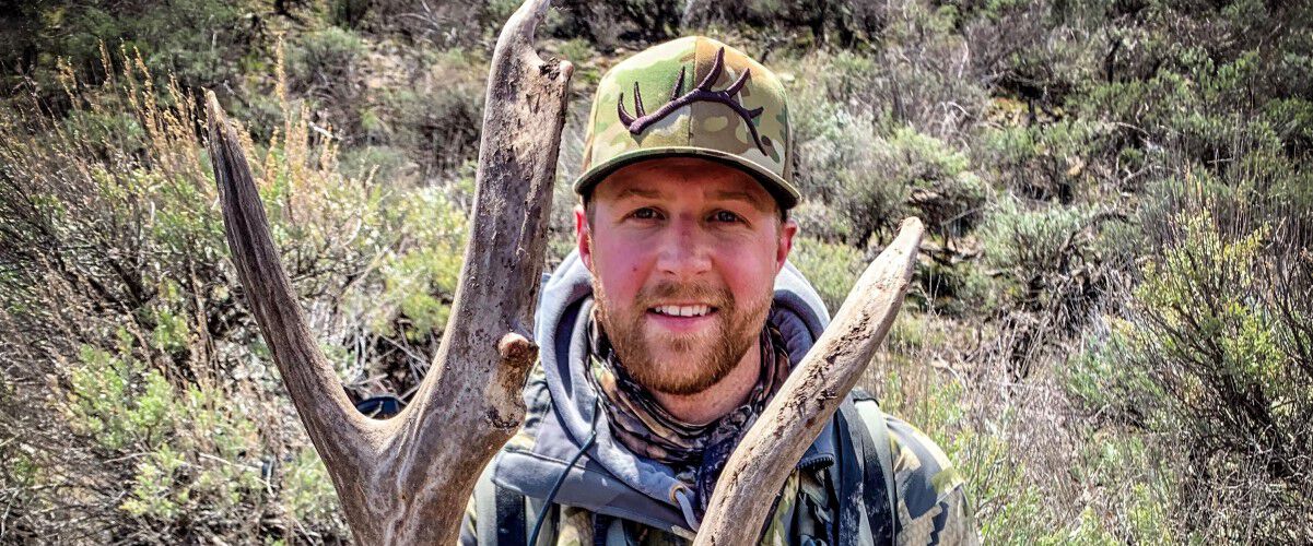 connor clark with a monster mule deer shed