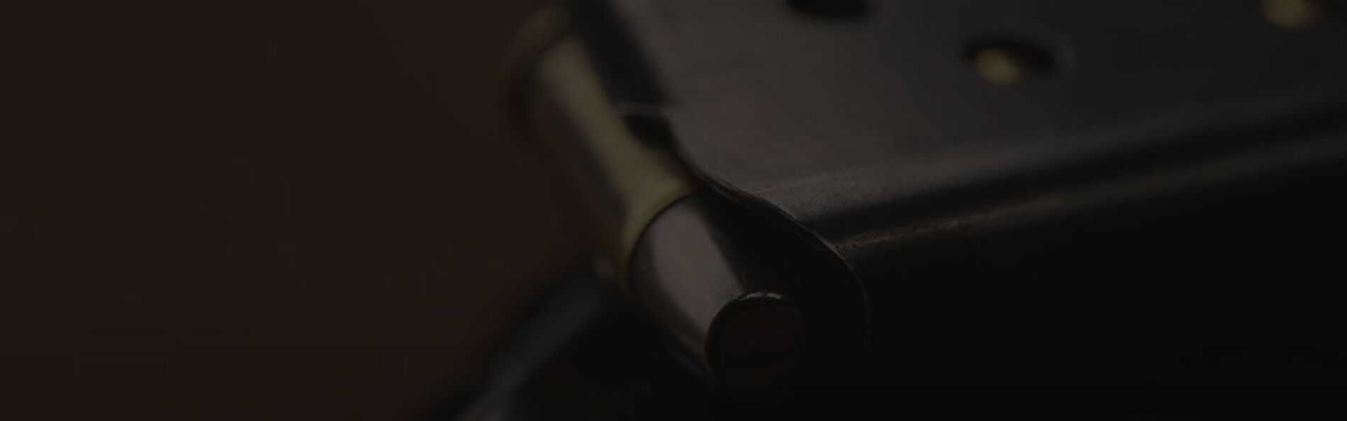 shooter at an indoor range shooting at a target