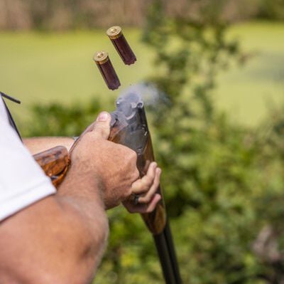 Shot HOA shells being ejected from a shotgun