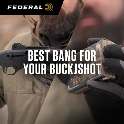 Josh Froelich aiming shotgun at an outdoor range