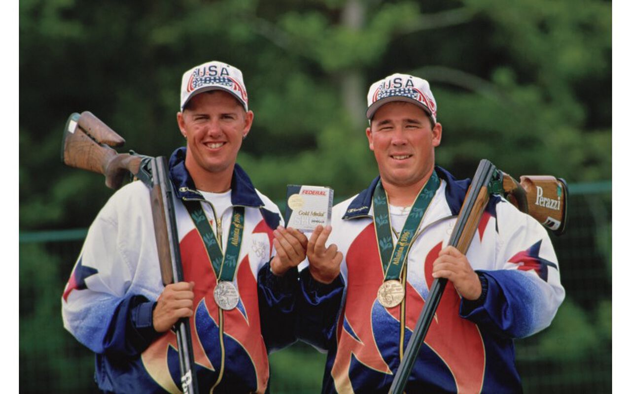 Josh Lakatos and Lance Bade with their metals during the 1996 Olympics