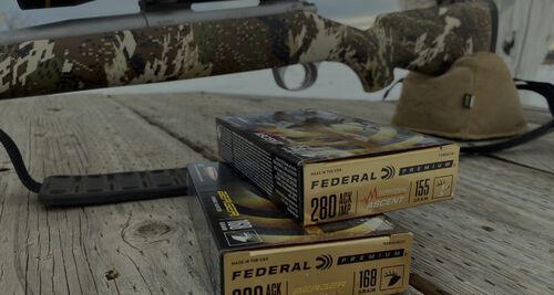 terminal ascent packages in front of a rifle