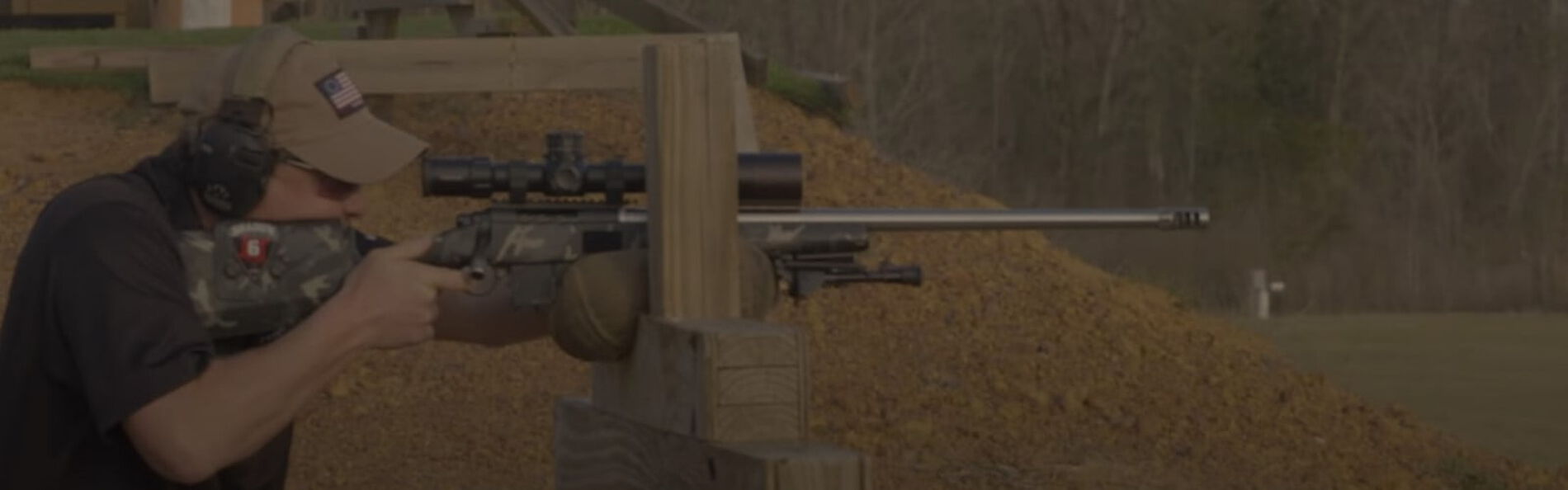 shooter looking down a rifle scope