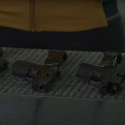 Josh holding a rifle with a coupled magazine