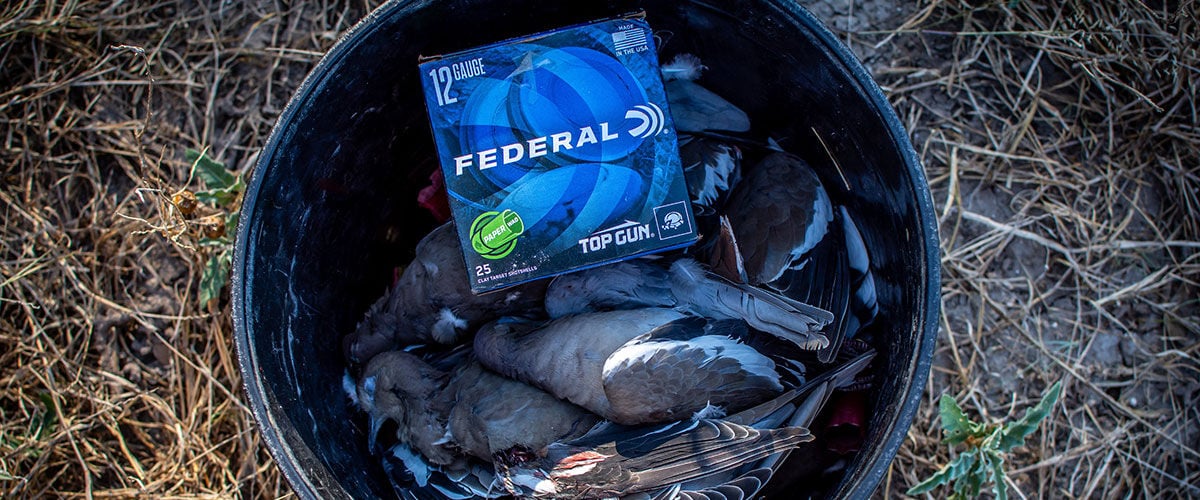 Top Gun box in a bucket with doves