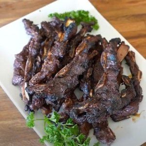elk korean short ribs on a plate with cilantro