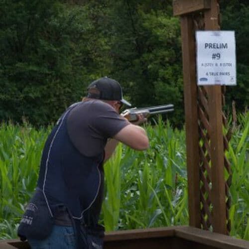 Derrick Mein shooting his shotgun