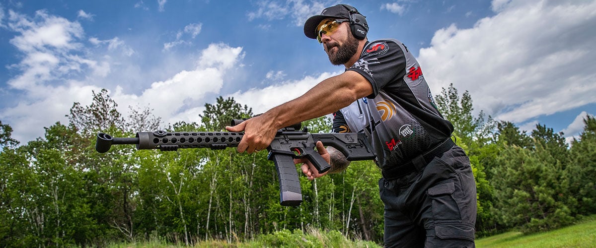 Josh Froelich aiming rifle