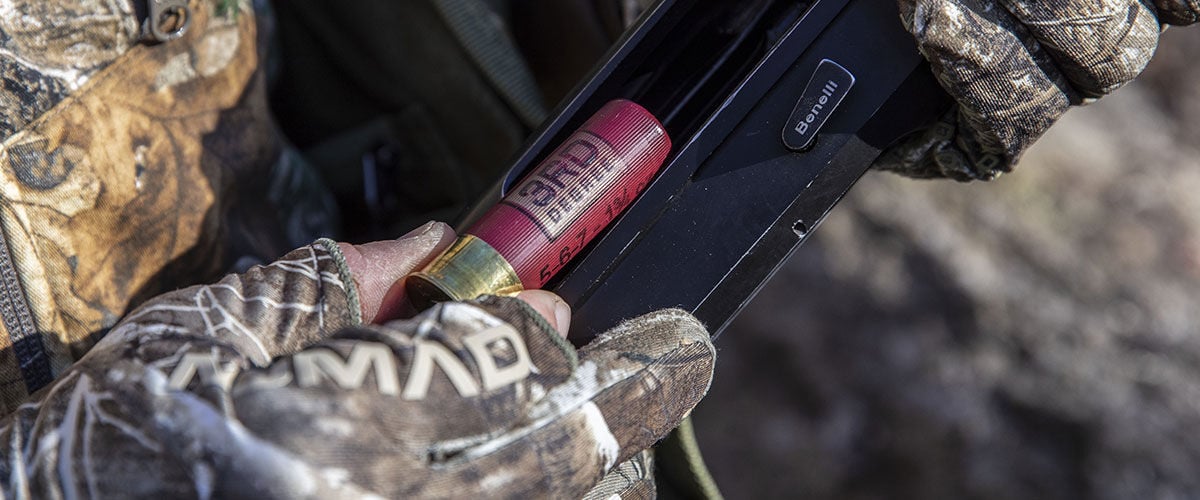 3rd Degree shotshell being loaded into a shotgun