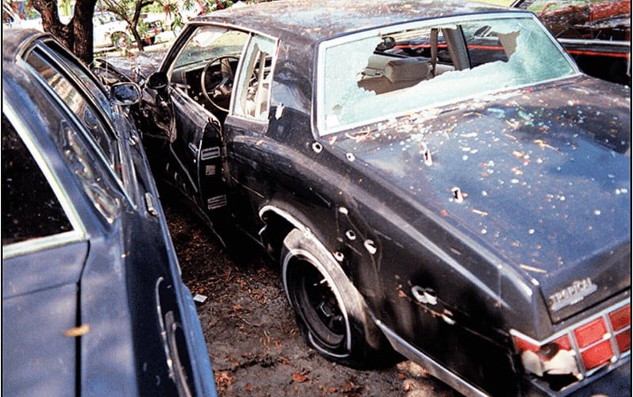 Monte Carlo with broken back window and other bullet holes