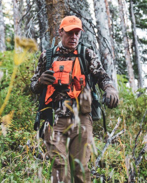 Steven Rinella walking through trees