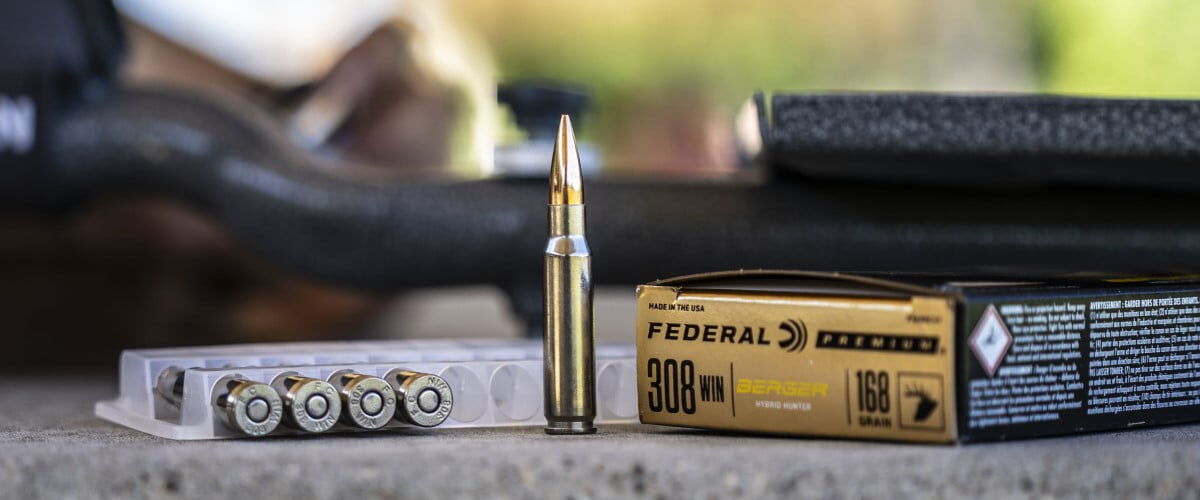 box of Berger Hybrid Hunter and cartridge on a table