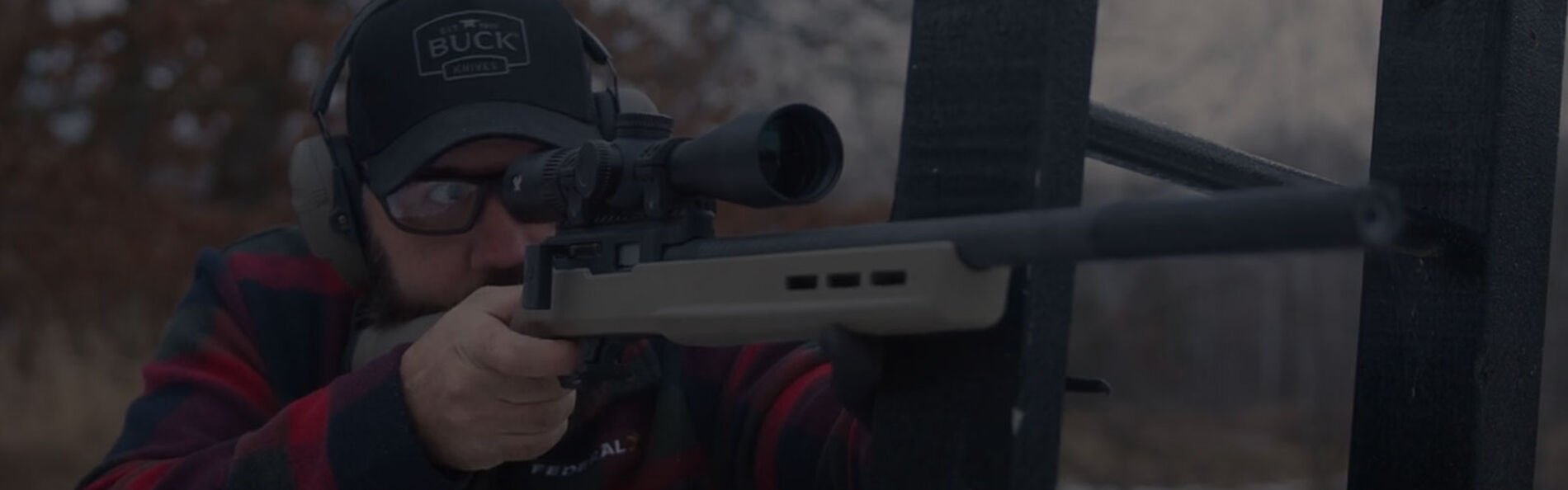 person holding a shotgun choke