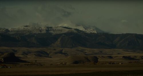 Snow capped mountain and plains