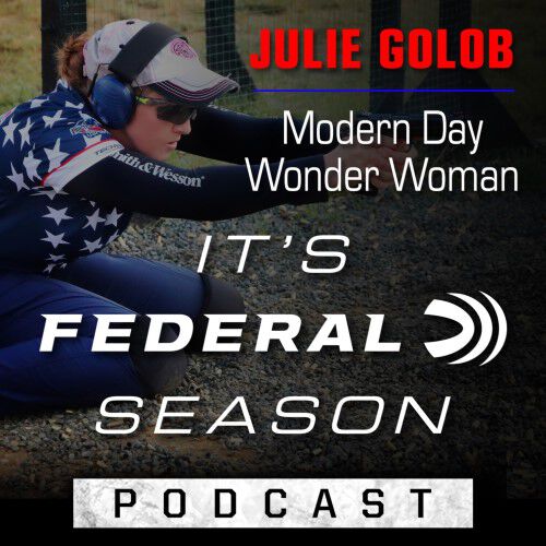 Julie Golob shooting a pistol while kneeling outside