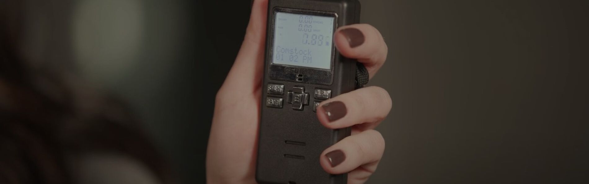 Krystal holding a range timer