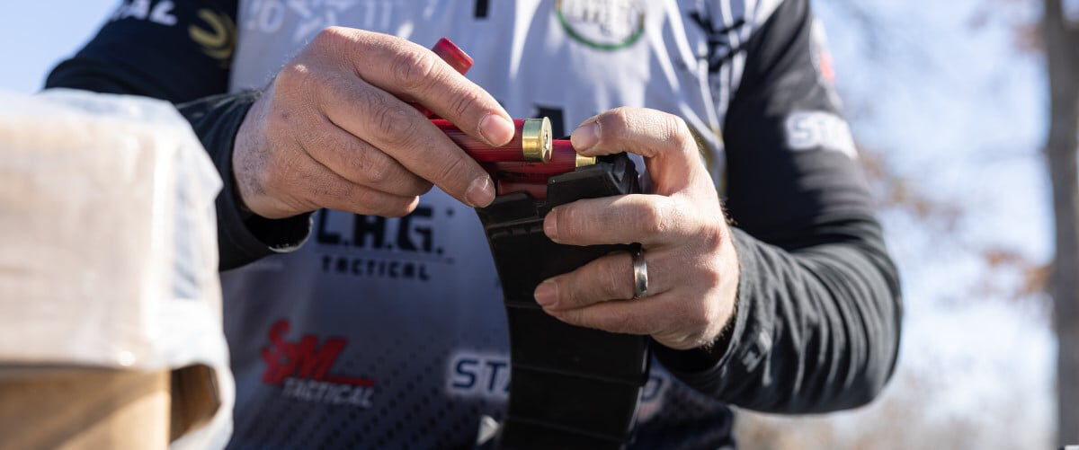 Josh Froleich loading a magazine with shotshells