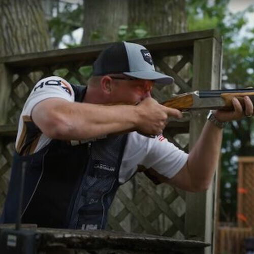 Derrick Mein shooting his shotgun