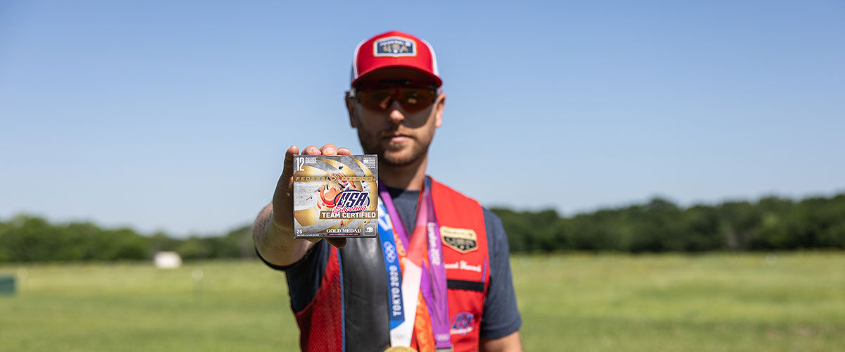 Vincent Hancock holding box of of Gold Medal