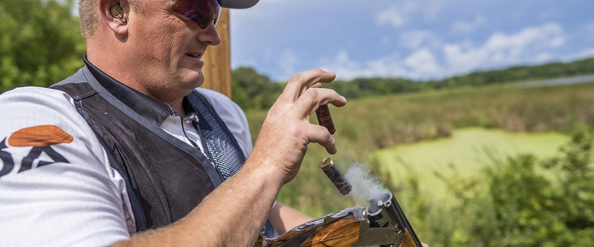 Derrick Mein ejecting shotshells from his shotgun