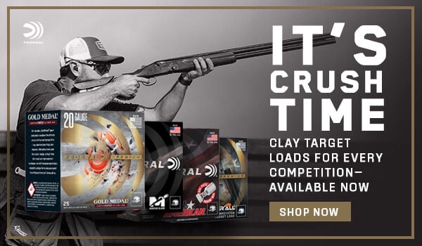 It's Crush Trime; Clay Target Loads for every compeition- available now; Shop Now; Shooter aiming shotgun with boxes of target shooting ammo.