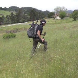Dave Castro Hiking up a Hill