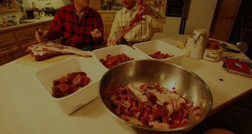 deer meat laid out on a table