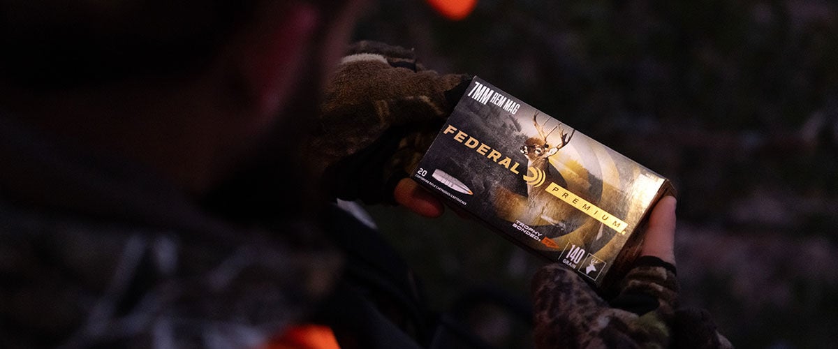 hunter holding box of Trophy Bonded