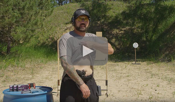 Josh Froelich showing concealed pistol