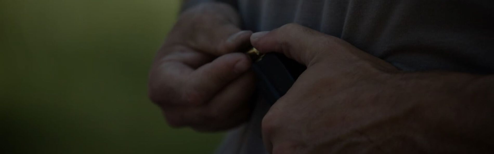 Handgun chamber being loaded