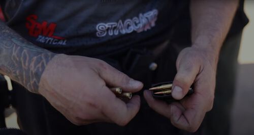 Ammo being loaded into a magazine