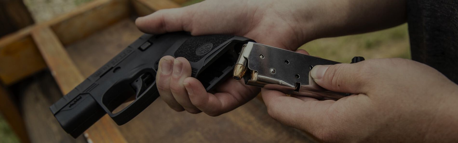 Sportswoman Courtney shooting a handgun