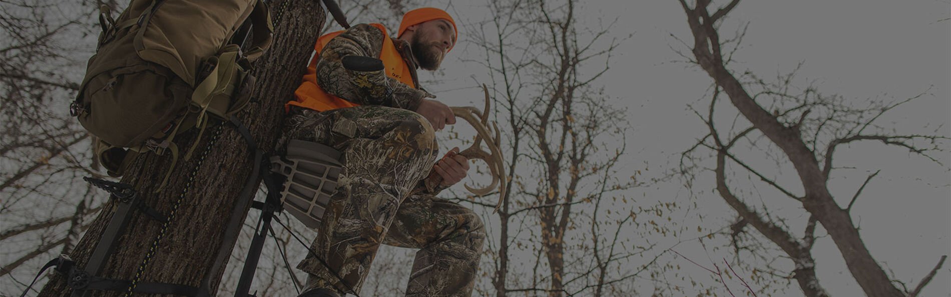 hunter sitting in a tree stand