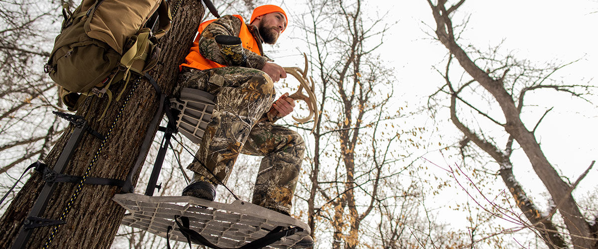 hunter sitting in a tree stand