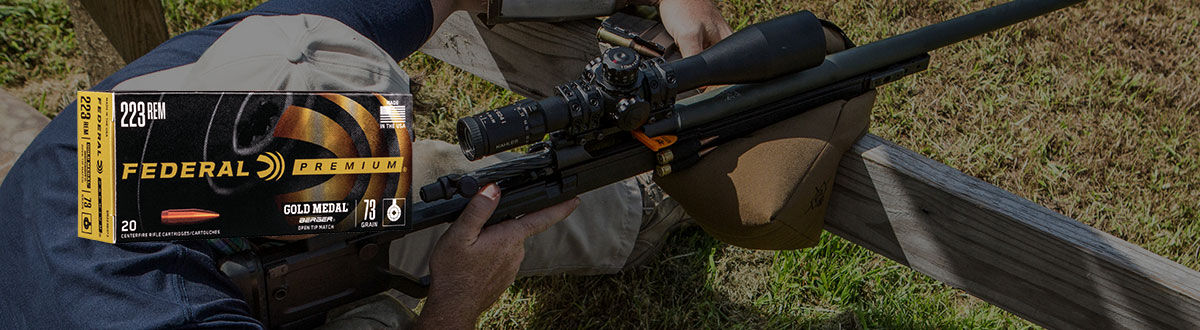 Man Shooting a Rifle