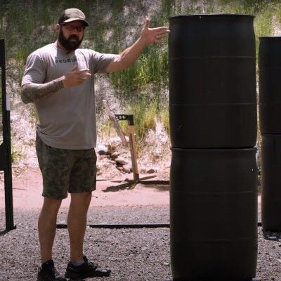 Josh Froelich showing the distance between him and the barrels cover infront of him