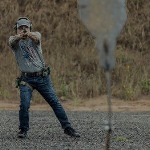 shooter aiming at a target at an outdoor range