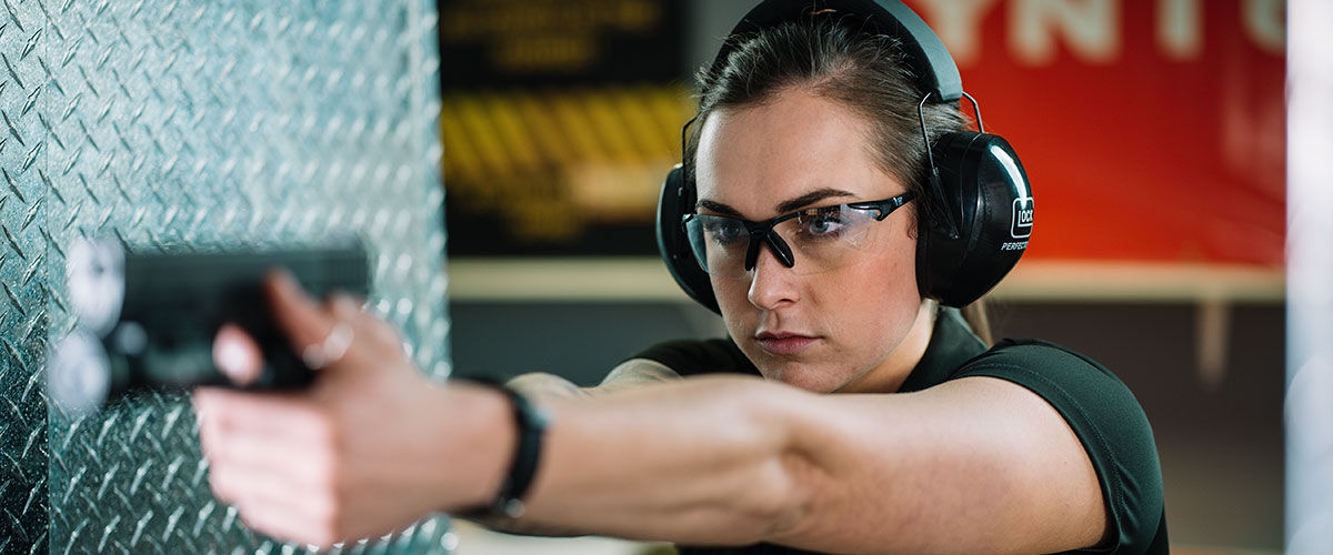Women holding Pistol/Handgun