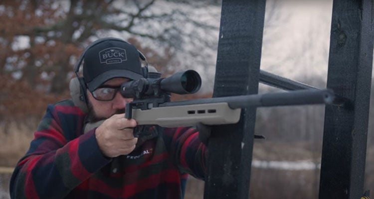 shooter aiming shotgun
