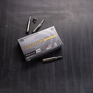 7mm Backcountry packaging and cartridges laying on atable